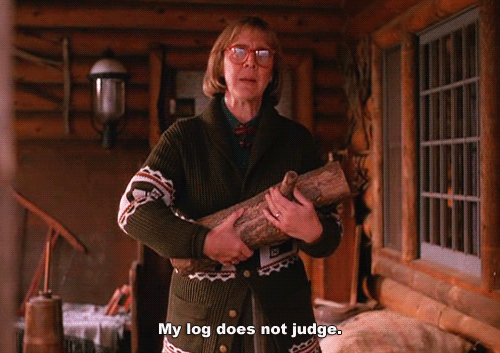 If a middle aged woman cradling a small log like a baby says it wants to tell you something what would you do?