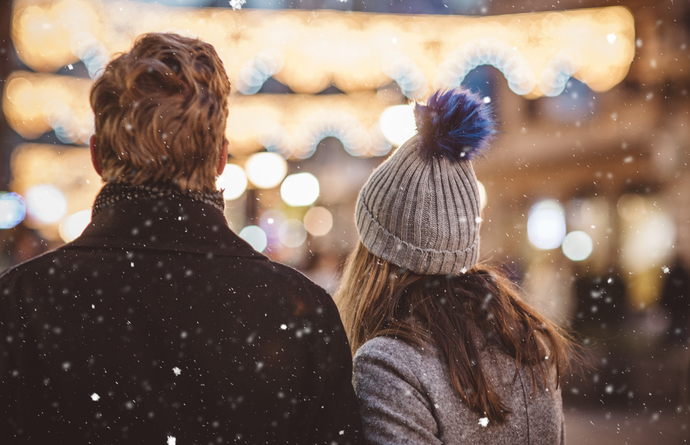 Ice skating, snow, white lights, and someone to share it with.