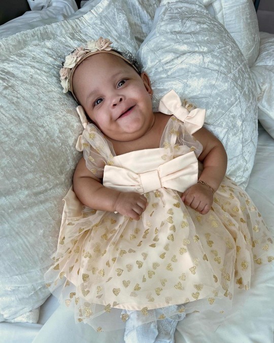 This kind nurse adopted a sick baby whose mother didnt want her. Do you think its better to adopt or have your own child?