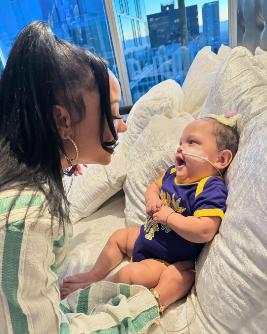 This kind nurse adopted a sick baby whose mother didnt want her. Do you think its better to adopt or have your own child?