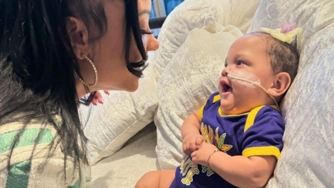 This kind nurse adopted a sick baby whose mother didn't want her. Do you think it's better to adopt or have your own child?