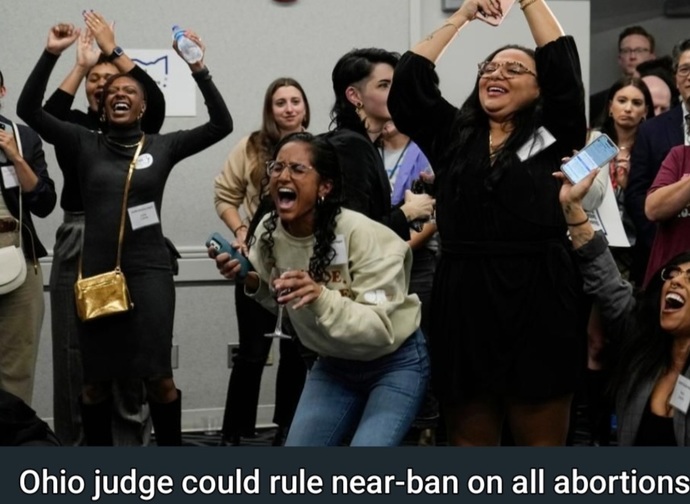 picture from a news website. women cheering related to a ban limiting nearly all abortions