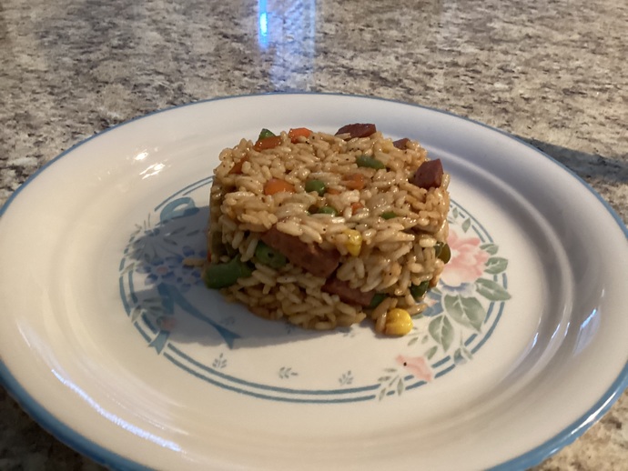 Do the veggies enhance the color scheme in this dish?