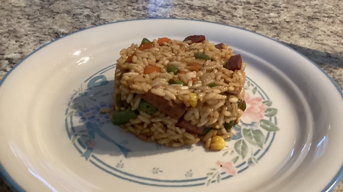 Do the veggies enhance the color scheme in this dish?