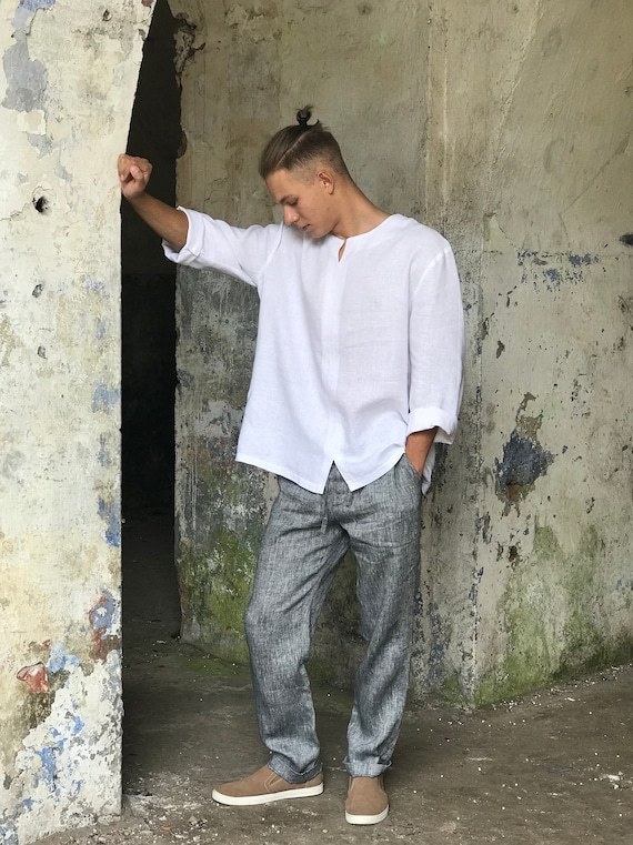 How should a good looking mans clothes fit?