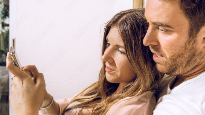 Is it normal that boyfriend always looks at my phone when I reply messages or when I play with my phone?