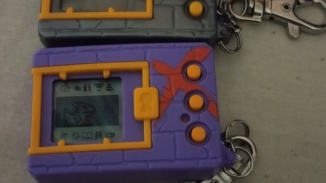 Which one of those 2 Digimon tamagotchis do you like most and did you have any growing up?