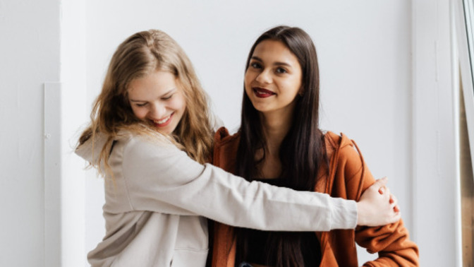 How do I get a socially awkward friend to get out of her shell and start dating again?