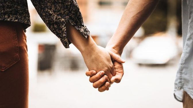 Is it OK for a man and a woman who are best friends to hold hands?