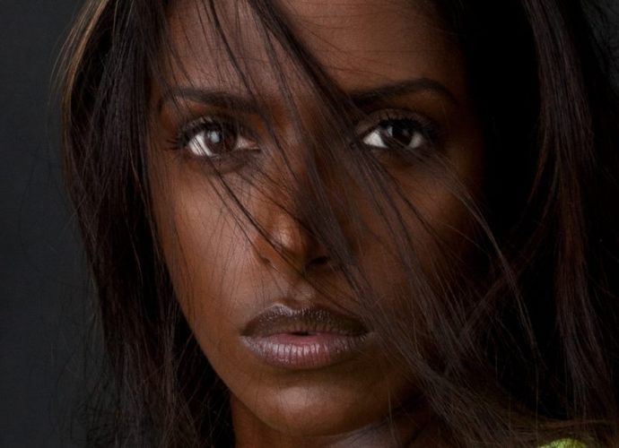 Why is dark skin considered less attractive especially on women?