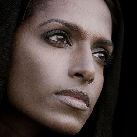 Why is dark skin considered less attractive especially on women?