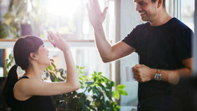How can I ask a woman (work colleague) to go out with me without seeming that it’s a date or that I’m romantically interested in her?