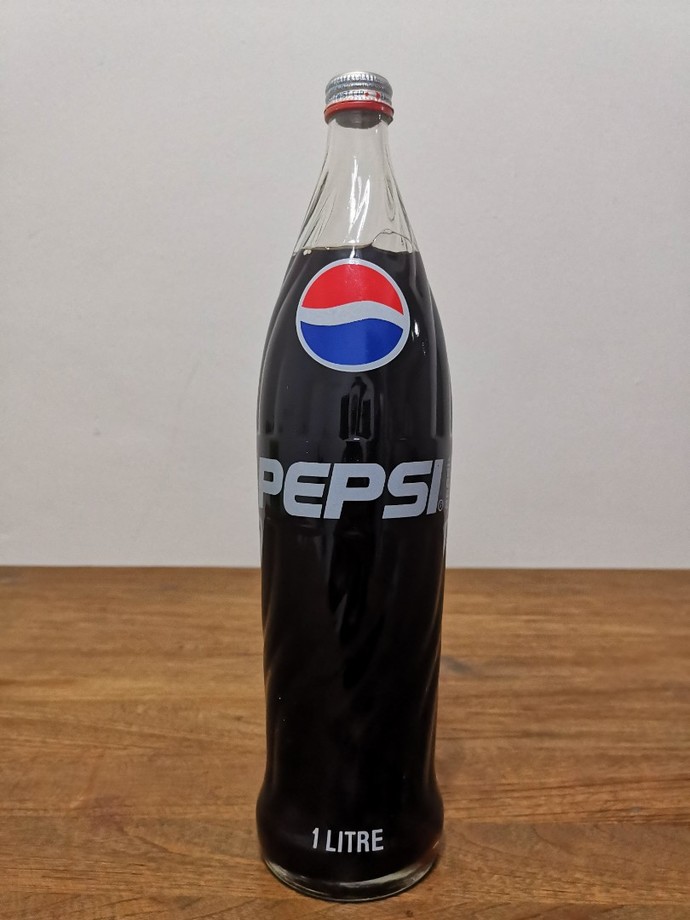 Do you prefer to buy your Pepsi-Cola bottled in plastic or glass & why?