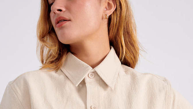 When you see a girl in a button up shirt with a collar, would you think she's a tomboy or gay or neither assumption?
