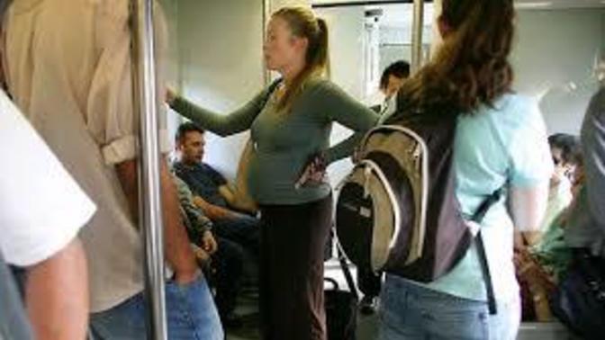 Should a man give up his seat on a bus if a woman is standing?