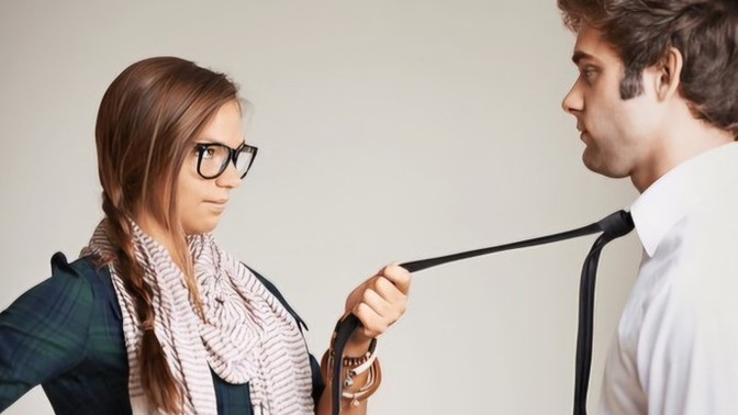 Grabbing his tie, is this common?