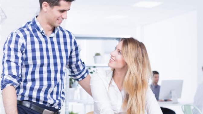 What are the signs that a married male coworker likes you?