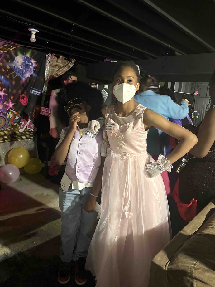 This was me at a murder mystery birthday party with my 8 year old cousin.