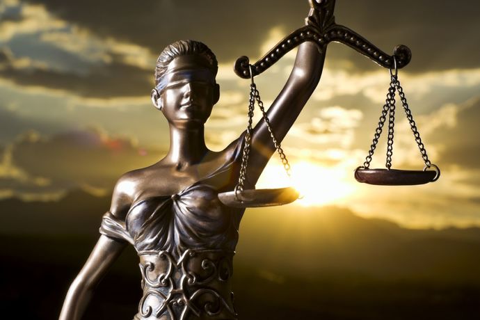 Are a legal system and a justice system the same thing?
