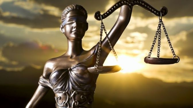Are a legal system and a justice system the same thing?