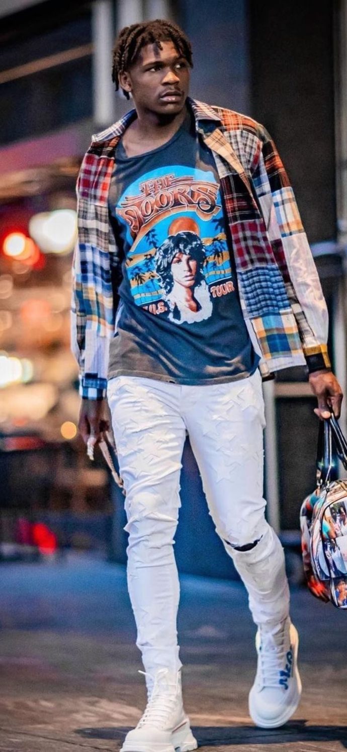 Girls, Whether you are into black dudes are not, do you find this man handsome?