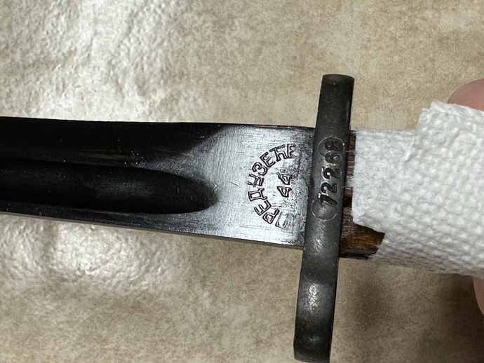 Can anyone here tell me what language this is on this bayonet?