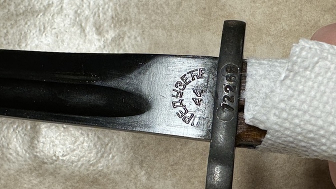 Can anyone here tell me what language this is on this bayonet?