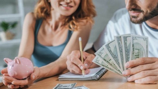 Should I be supporting my girlfriend and her son on vacation for a fair amount of money?