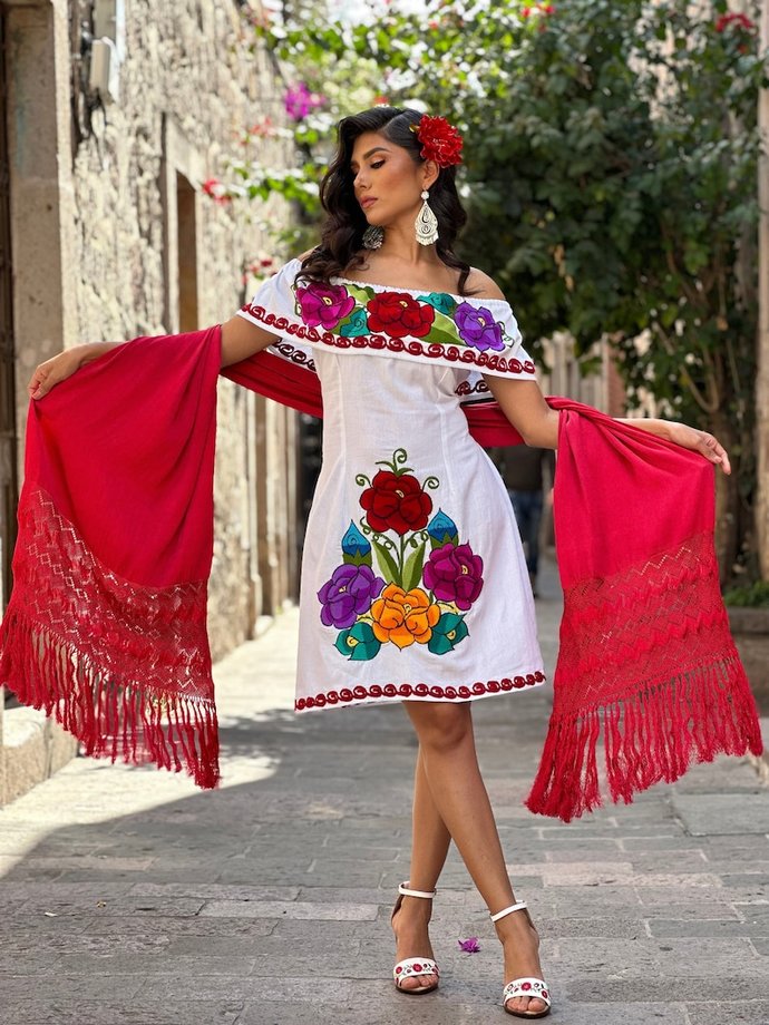 Whats your opinion on these two dresses?
