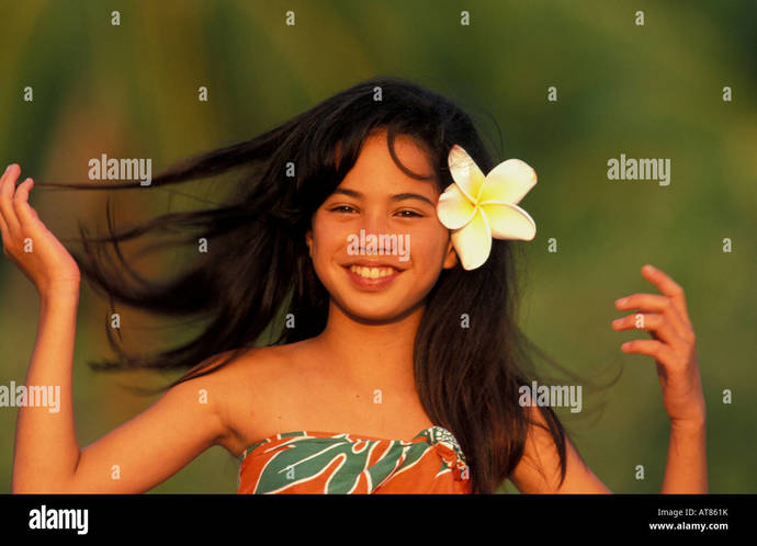 Do you find it cute on a woman with a flower in her hair like this?