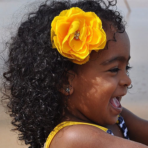 Do you find it cute on a woman with a flower in her hair like this?