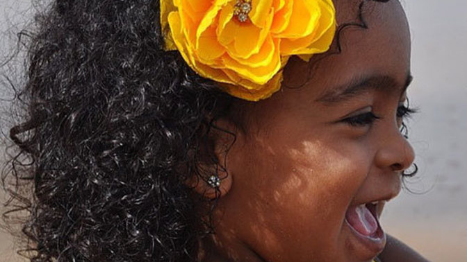 Do you find it cute on a woman with a flower in her hair like this?