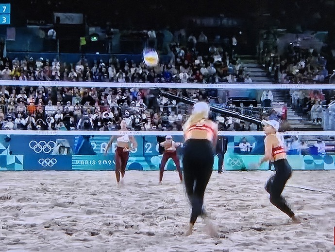 Why are the beach volleyball players playing in long pants?