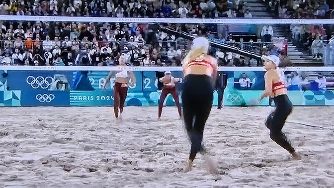 Why are the beach volleyball players playing in long pants?