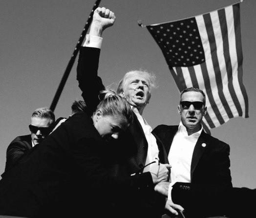 The Hitler photo is real, who is going to say that Trump did not want to recreate this moment for his cult?