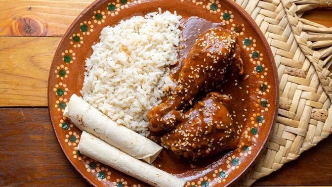 Is mole sauce just indian curry with added chocolate?