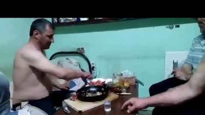 How is the Russian man burning after he drinks Vodka?