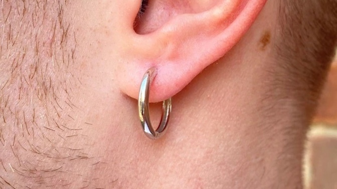 Is it gay for men to wear hoop earrings?