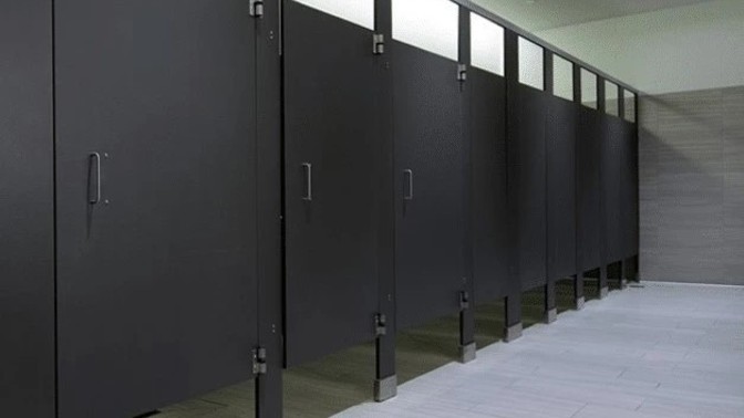 Why does a woman's bathroom have more bathroom stalls and room than the men bathroom does?
