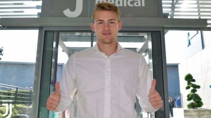 Why do guys often look attractive wearing a shirt with the collar open?