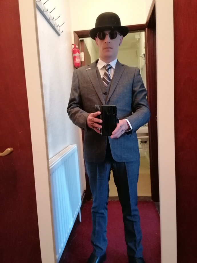 How do we get men to wear hats again?
