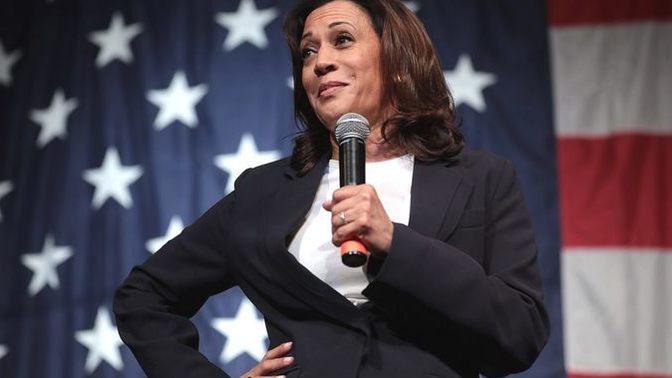 What does it say about a man that would vote for a woman to be president in this case for Kamala Harris?