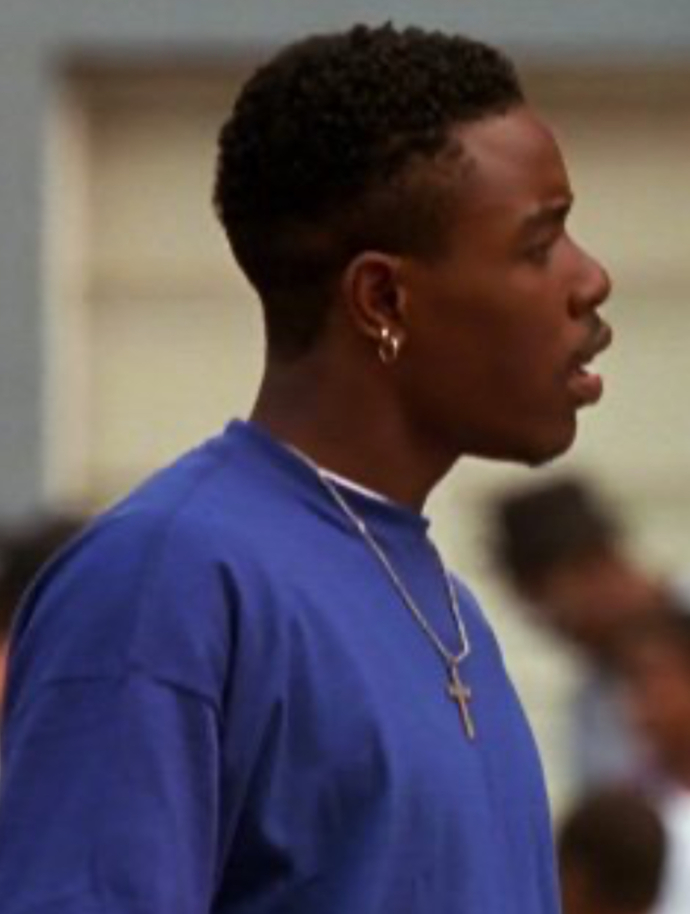 What hairstyle did Caine (Tyrin Turner) have in the movie Menace II Society? Is it a Jheri fade or is it a natural haircut? If so, what is it called?