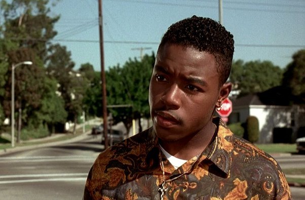 What hairstyle did Caine (Tyrin Turner) have in the movie Menace II Society? Is it a Jheri fade or is it a natural haircut? If so, what is it called?