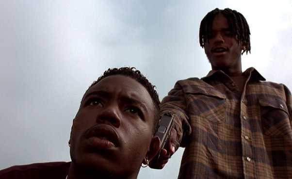 What hairstyle did Caine (Tyrin Turner) have in the movie Menace II Society? Is it a Jheri fade or is it a natural haircut? If so, what is it called?
