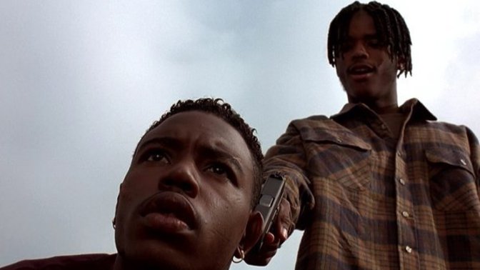What hairstyle did Caine (Tyrin Turner) have in the movie Menace II Society? Is it a Jheri fade or is it a natural haircut? If so, what is it called?