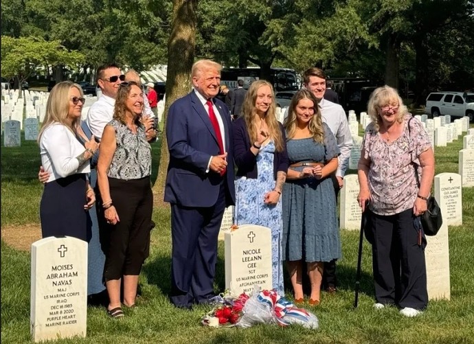 Should Trump be taking pictures alongside the headstones of fallen soldiers giving a thumbs up? Is this appropriate? A campaign prop?