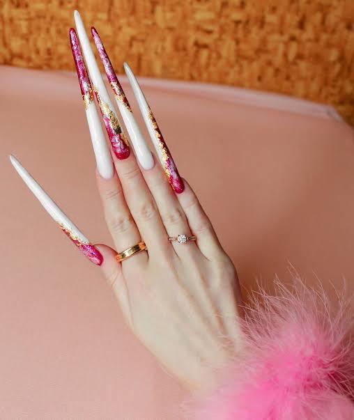 Do men care if woman has her nails done or men prefer women with natural nails?