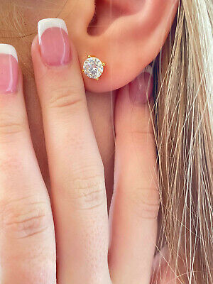 Girls, If you were on a date with a guy wearing this 2 carat diamond earring, would you notice it? Also, what would you think after seeing it?