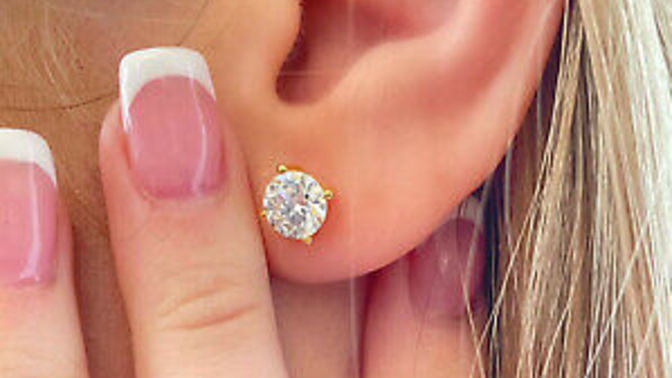 Girls, If you were on a date with a guy wearing this 2 carat diamond earring, would you notice it? Also, what would you think after seeing it?